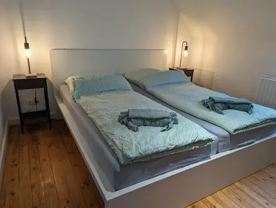 Ein Bett oder Betten in einem Zimmer der Unterkunft Ferienhaus AKate
