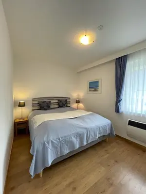 Ein Bett oder Betten in einem Zimmer der Unterkunft 