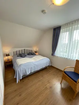 Ein Bett oder Betten in einem Zimmer der Unterkunft 
