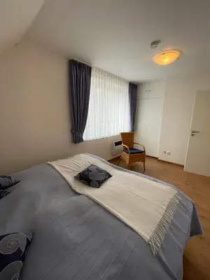 Ein Bett oder Betten in einem Zimmer der Unterkunft 