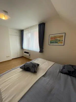 Ein Bett oder Betten in einem Zimmer der Unterkunft 