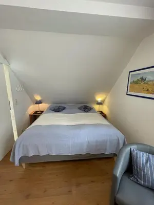 Ein Bett oder Betten in einem Zimmer der Unterkunft 