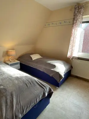 Ein Bett oder Betten in einem Zimmer der Unterkunft 
