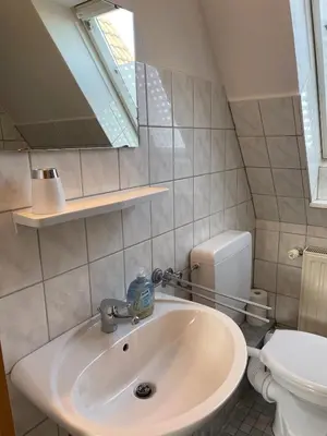 Ein Badezimmer in der Unterkunft 