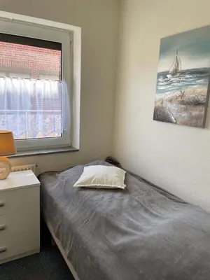 Ein Bett oder Betten in einem Zimmer der Unterkunft 