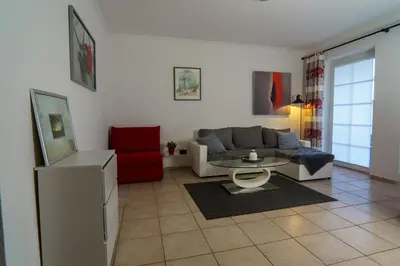 Ein Sitzbereich in der Unterkunft Gleich hinterm Deich 2