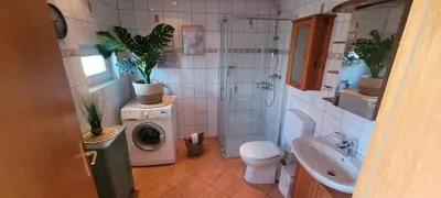 Ein Badezimmer in der Unterkunft Büsumhaus Birgit