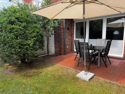 Ein Garten an der Unterkunft Seeadler, Ferienwohnung 3 inkl. Strandkorb