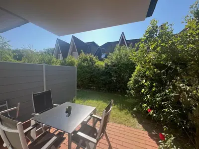 Ein Garten an der Unterkunft Seeadler, Ferienwohnung 3 inkl. Strandkorb
