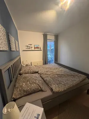 Ein Bett oder Betten in einem Zimmer der Unterkunft Ferienwohnung in Dorum