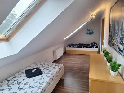 Ein Bett oder Betten in einem Zimmer der Unterkunft Ferienwohnung Fischers Fritze
