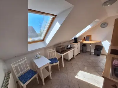 Ein Sitzbereich in der Unterkunft Ferienwohnung Fischers Fritze