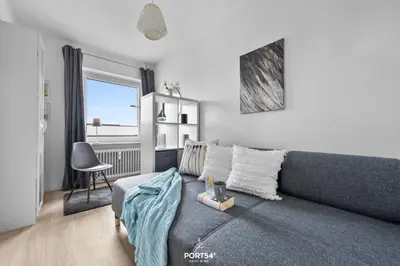 Ein Sitzbereich in der Unterkunft Ferienwohnung Bake 21