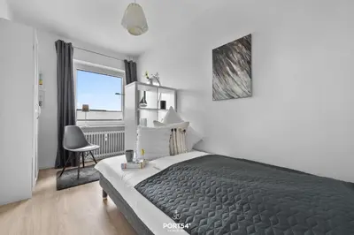 Ein Bett oder Betten in einem Zimmer der Unterkunft Ferienwohnung Bake 21