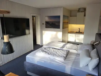 Ein Bett oder Betten in einem Zimmer der Unterkunft ANKERGLÜCK inkl Ebikes