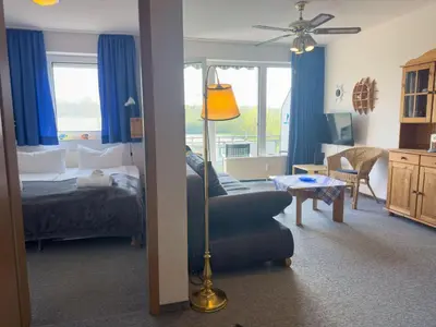 Ein Bett oder Betten in einem Zimmer der Unterkunft Haus Seewind Wohnung 3
