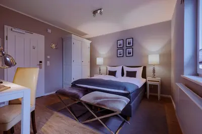 Ein Bett oder Betten in einem Zimmer der Unterkunft Hotel Astra Maris