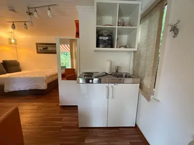 Ein Bett oder Betten in einem Zimmer der Unterkunft Haus Kehrwieder Datscha Gartenhaus