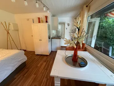 Ein Bett oder Betten in einem Zimmer der Unterkunft Haus Kehrwieder Datscha Gartenhaus