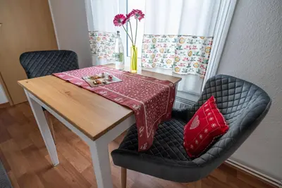 Ein Sitzbereich in der Unterkunft Haus Kehrwieder Wohnung Südsee