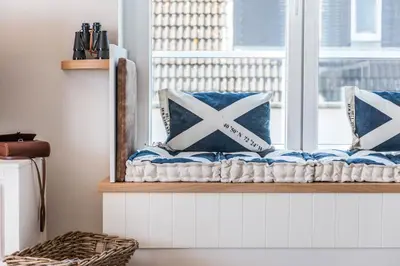 Ein Bett oder Betten in einem Zimmer der Unterkunft Haus Deichkieker Apartment 3 1 Strandsegler