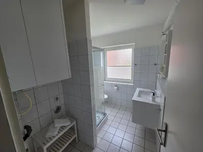 Ein Badezimmer in der Unterkunft FeWo Büsum No 12