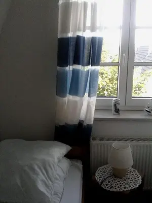 Ein Bett oder Betten in einem Zimmer der Unterkunft Nordseewind