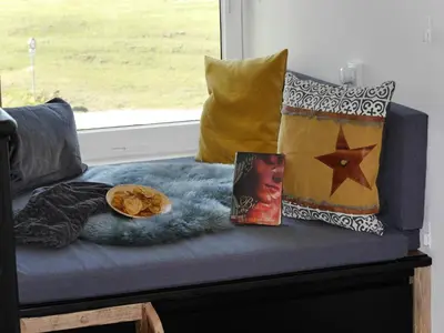 Ein Sitzbereich in der Unterkunft Ferienwohnung Deichbude 13 im Hochhaus