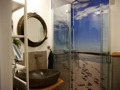 Ein Badezimmer in der Unterkunft Ferienwohnung Deichbude 13 im Hochhaus