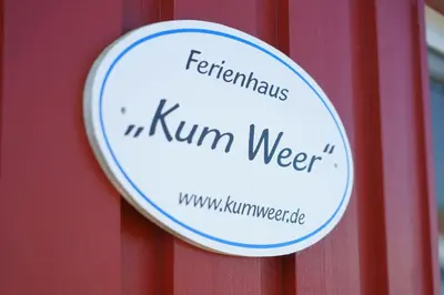 Ein Zertifikat, Auszeichnung, Logo oder anderes Dokument, das in der Unterkunft Ferienhaus Kum Weer ausgestellt ist