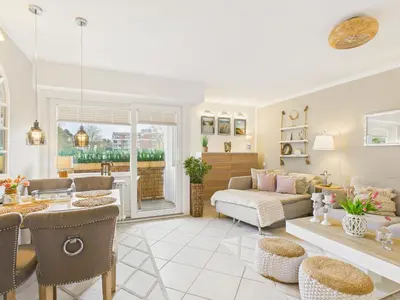Ein Sitzbereich in der Unterkunft Terrassenhaus Whg 10 Wattbutze mit Schwimmbad