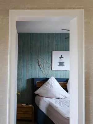 Ein Bett oder Betten in einem Zimmer der Unterkunft Nordseeblick