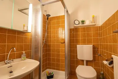 Ein Badezimmer in der Unterkunft Perle am Meer