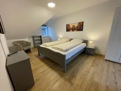Ein Bett oder Betten in einem Zimmer der Unterkunft Haus Seemeile