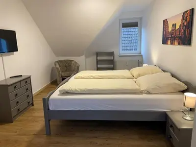 Ein Bett oder Betten in einem Zimmer der Unterkunft Haus Seemeile