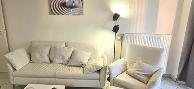 Ein Sitzbereich in der Unterkunft Seeschwalbe