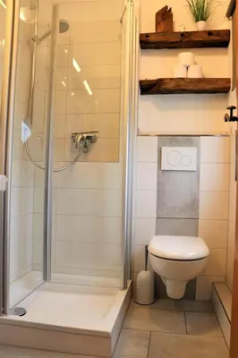 Ein Badezimmer in der Unterkunft 4 Personen Ferienhaus mit Kaminofen und Kanu in Otterndorf