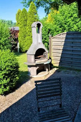 Ein Garten an der Unterkunft 4 Personen Ferienhaus mit Kaminofen und Kanu in Otterndorf