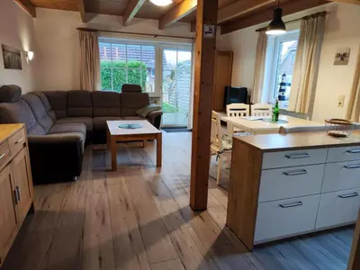 Ein Sitzbereich in der Unterkunft 4 Personen Ferienhaus mit zwei Toiletten in Otterndorf