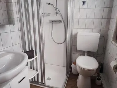 Ein Badezimmer in der Unterkunft 4 Personen Ferienhaus mit 3 Schlafzimmern in Otterndorf