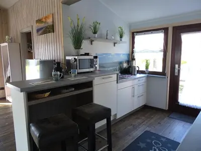 Küche/Küchenzeile in der Unterkunft 4 Personen Ferienhaus Windrose mit Kanu in Otterndorf