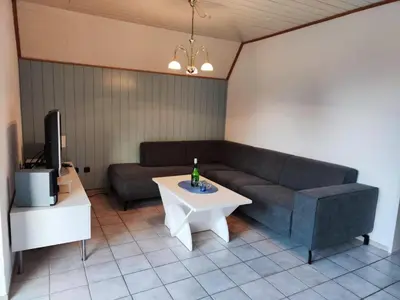Ein Sitzbereich in der Unterkunft 4 Personen Ferienhaus in zweiter Reihe zum Deich in Otterndorf