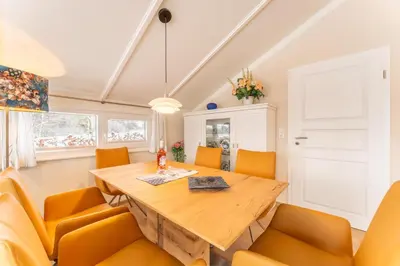 Ein Sitzbereich in der Unterkunft 4 Personen ebenerdiges, barrierefreies Ferienhaus in erster Reihe zum See in Otterndorf
