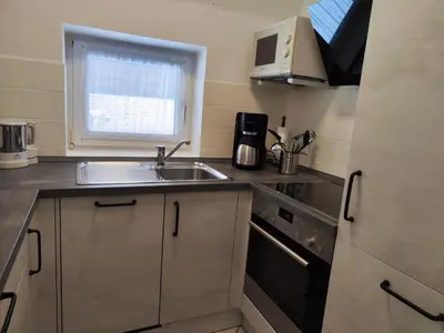 Küche/Küchenzeile in der Unterkunft 4 Personen Ferienhaus mit zwei Duschen und Toiletten in zweiter Reihe zum Deich in Otterndorf