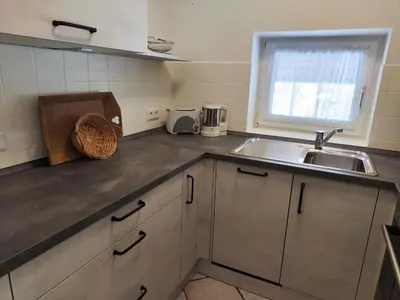Küche/Küchenzeile in der Unterkunft 4 Personen Ferienhaus mit zwei Duschen und Toiletten in zweiter Reihe zum Deich in Otterndorf