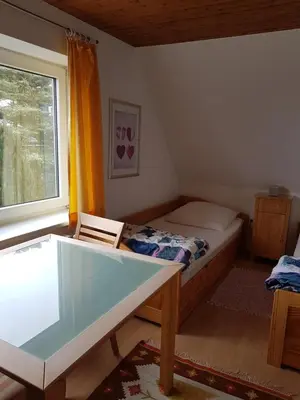 Ein Bett oder Betten in einem Zimmer der Unterkunft Berberhof