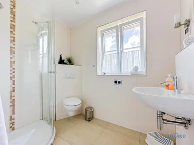 Ein Badezimmer in der Unterkunft Ferienhaus Kugelbake