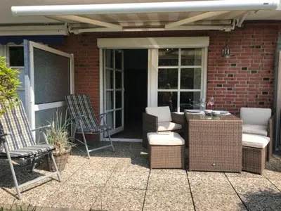 Ein Patio oder anderer Außenbereich in der Unterkunft De lütte Warftkieker