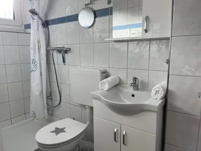 Ein Badezimmer in der Unterkunft Austernfischer