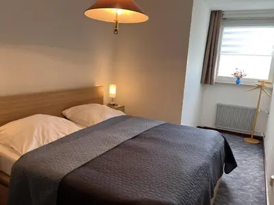 Ein Bett oder Betten in einem Zimmer der Unterkunft Tideblick